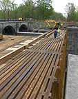 Nine Mile Creek Aqueduct restoration - Bottom timber in its temporary location
