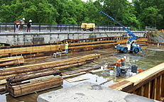 Nine Mile Creek Aqueduct restoration - Side beam being swung into place