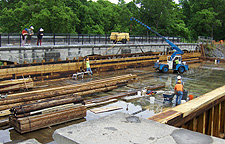 Nine Mile Creek Aqueduct restoration - Side beam being fitted into place